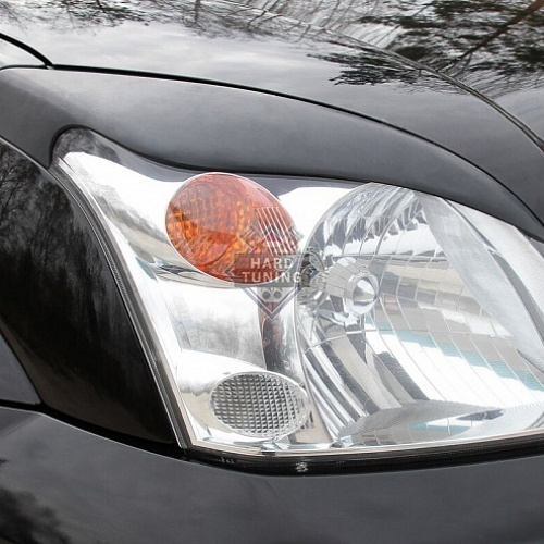 Накладки на фары фигурные Toyota Land Cruiser Prado 120