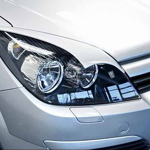 Накладки на фары фигурные Opel Astra H/GTC (2005-2011)